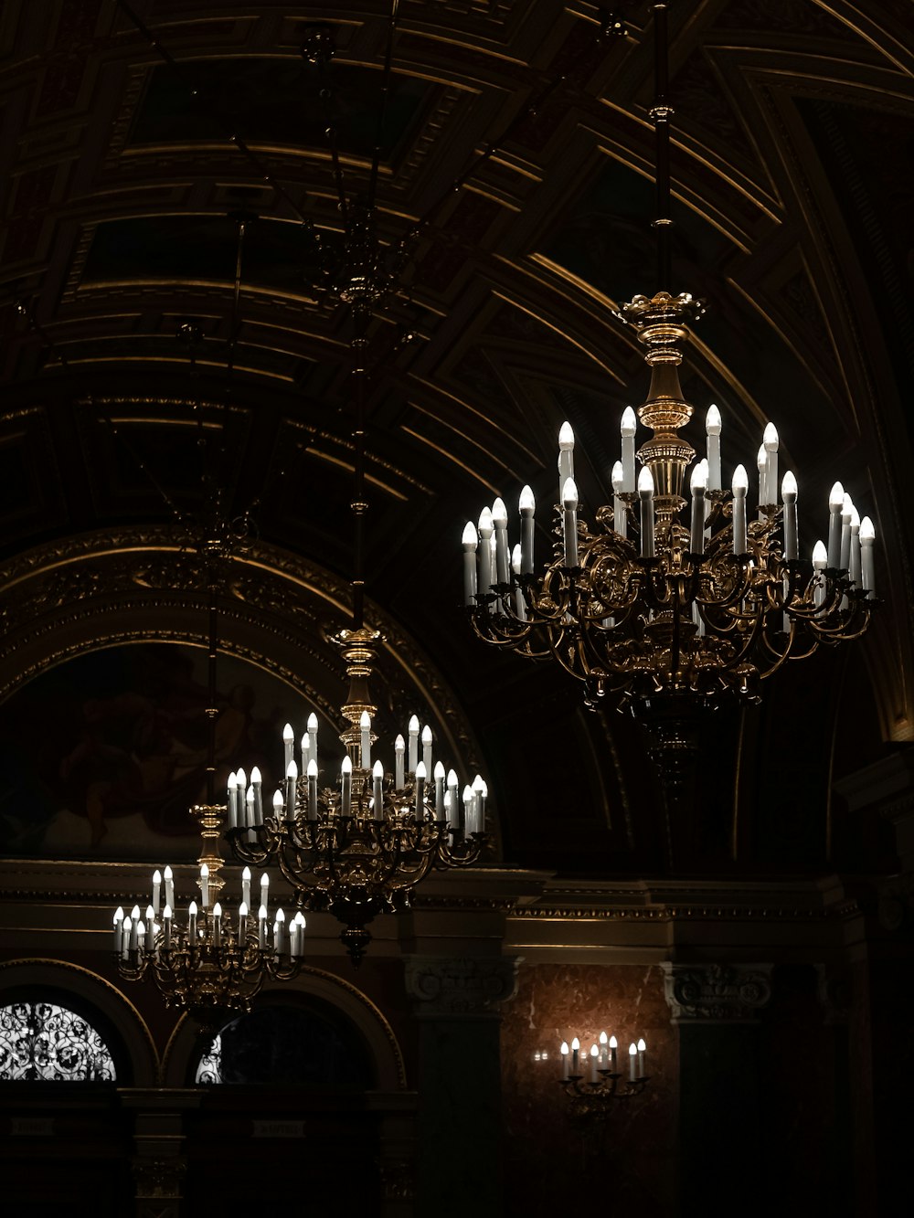 a chandelier hanging from the ceiling of a building