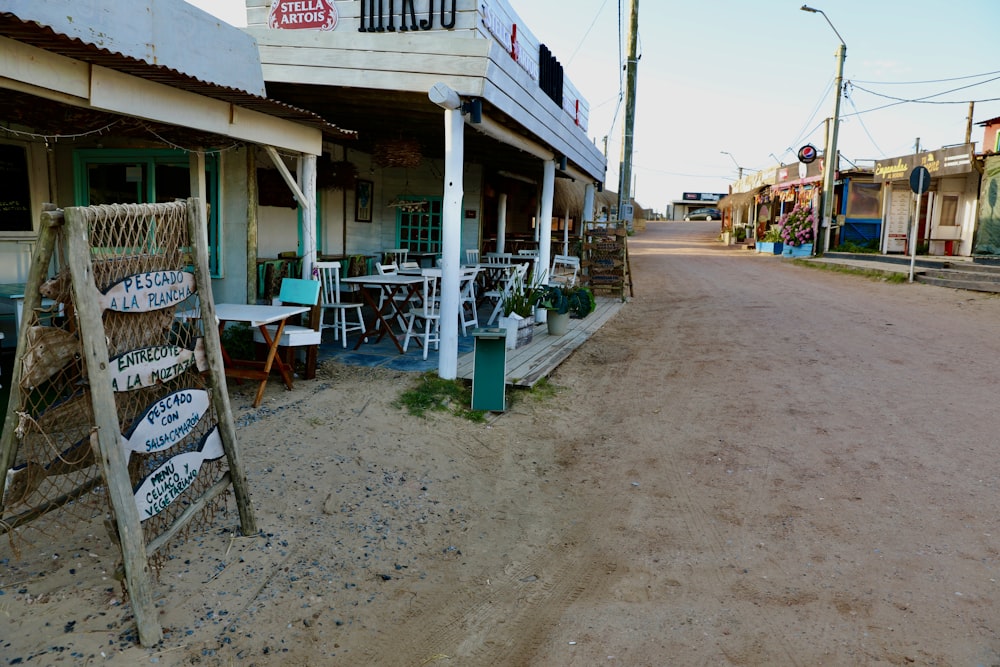 a street corner with a sign and a ladder