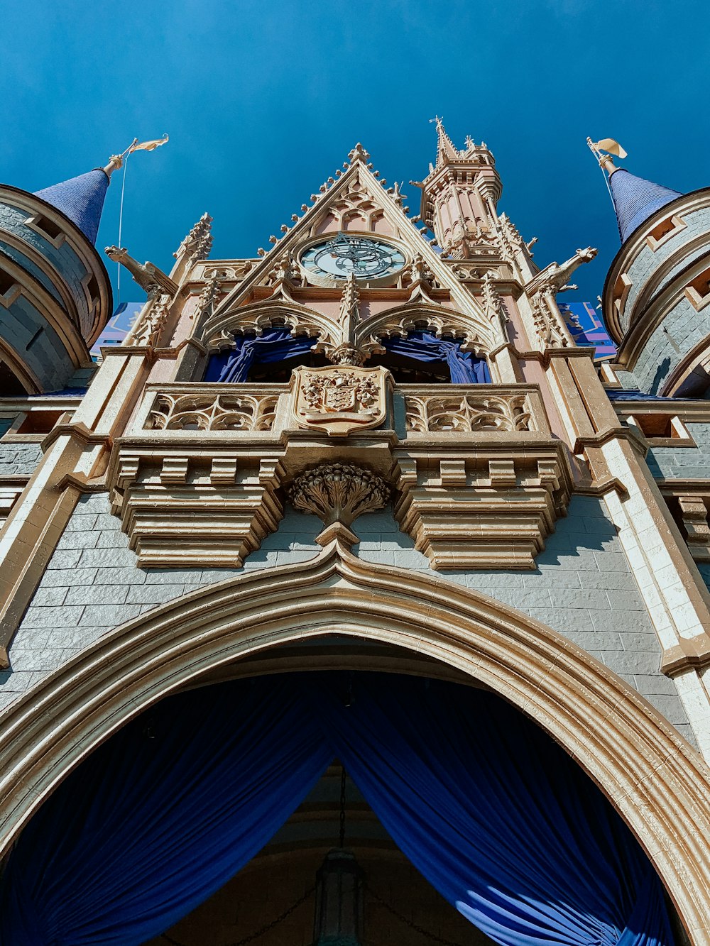 a large building with a clock on it's side