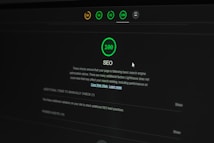 A dark-themed web interface displays an SEO performance score of 100. Multiple indicators at the top show different scores in circular icons. Text below explains the significance of the SEO score and offers additional actions to improve website optimization. A cursor is partially visible.