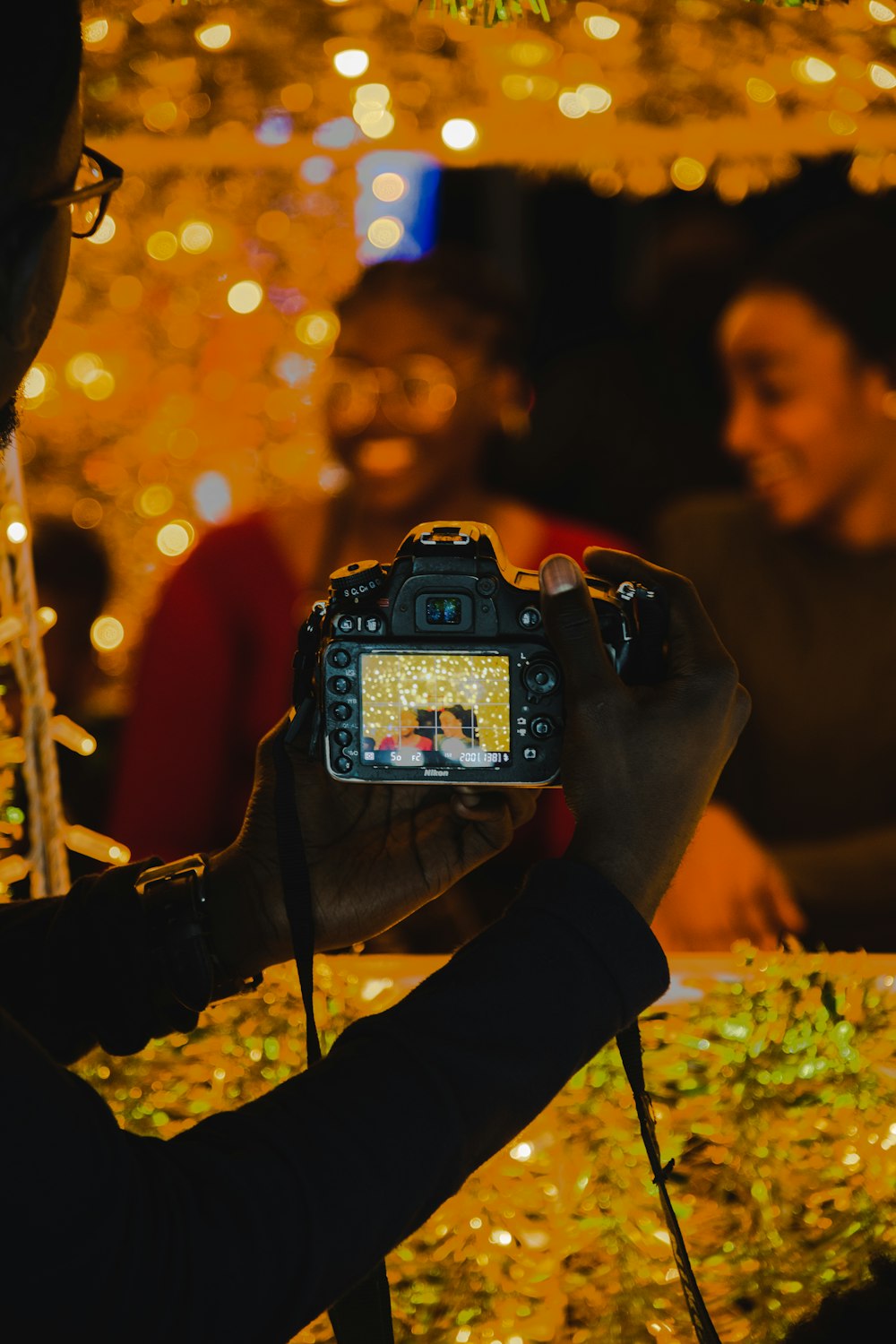 a person taking a picture with a camera