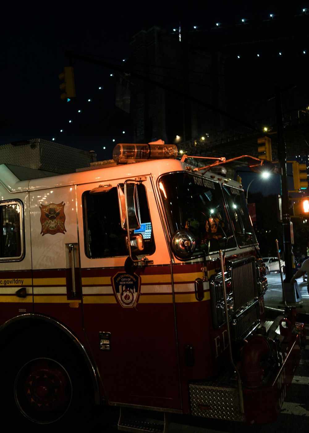 a fire truck parked on the side of the road