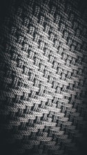 a black and white photo of a woven material
