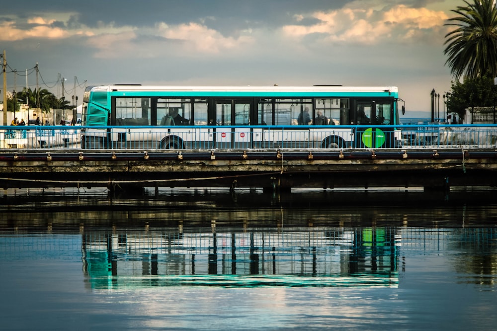 a bus that is sitting on a bridge