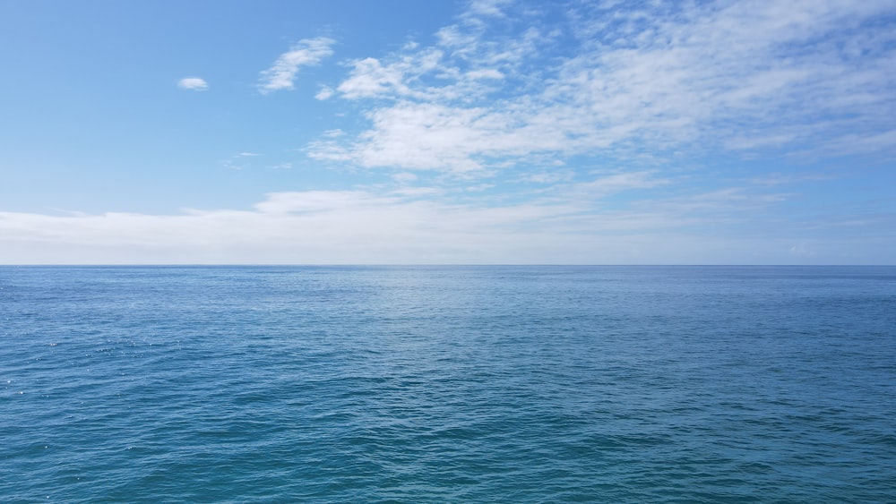 a body of water with a sky background