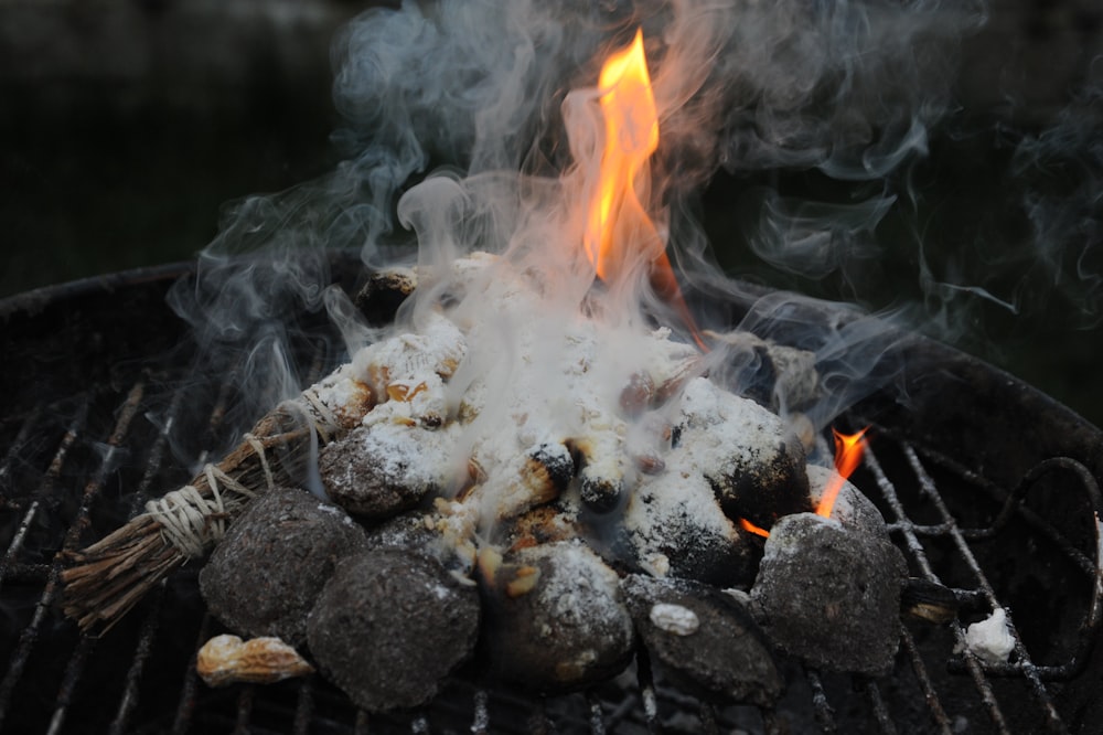 a close up of a grill with food on it