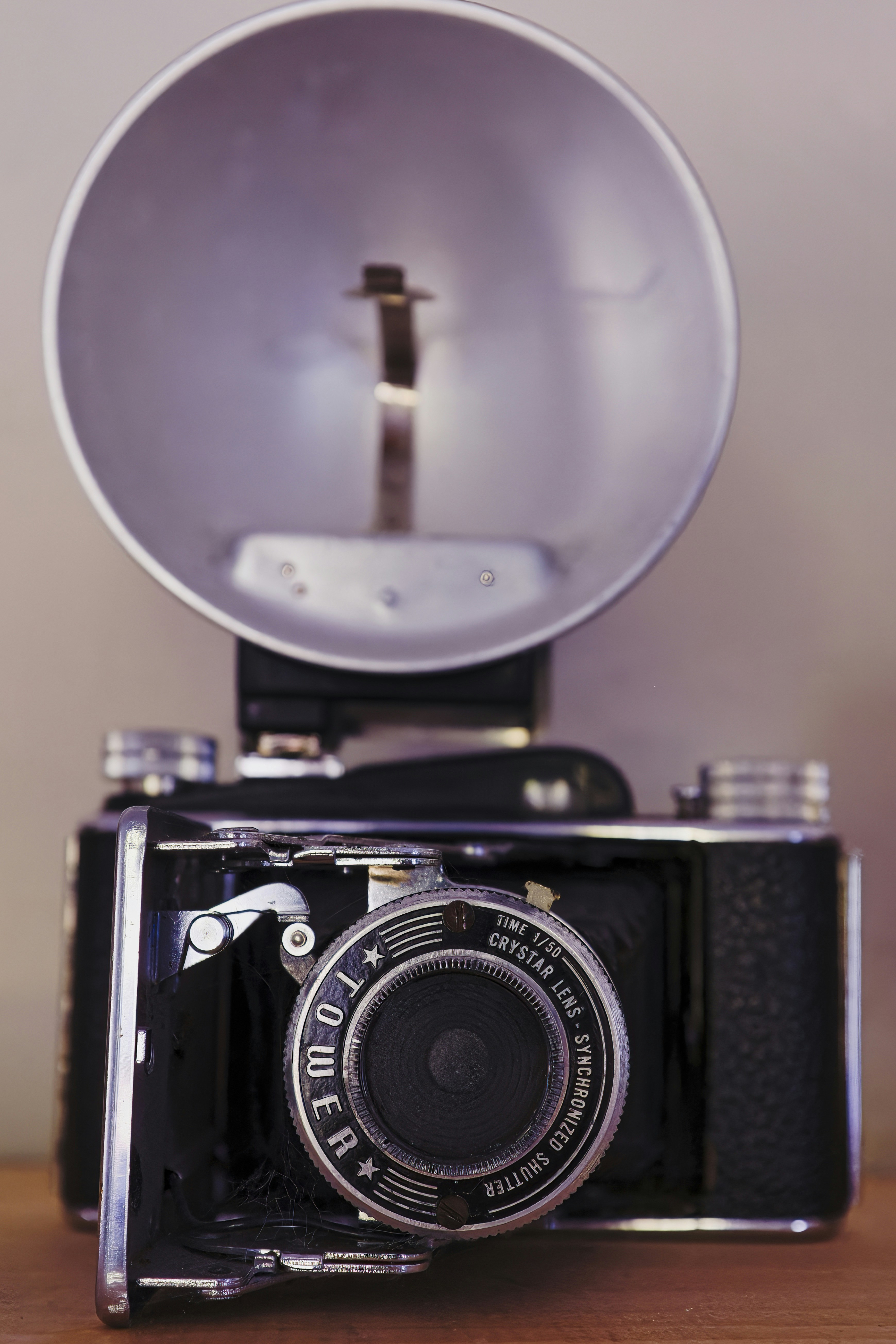 a camera with a mirror on top of it