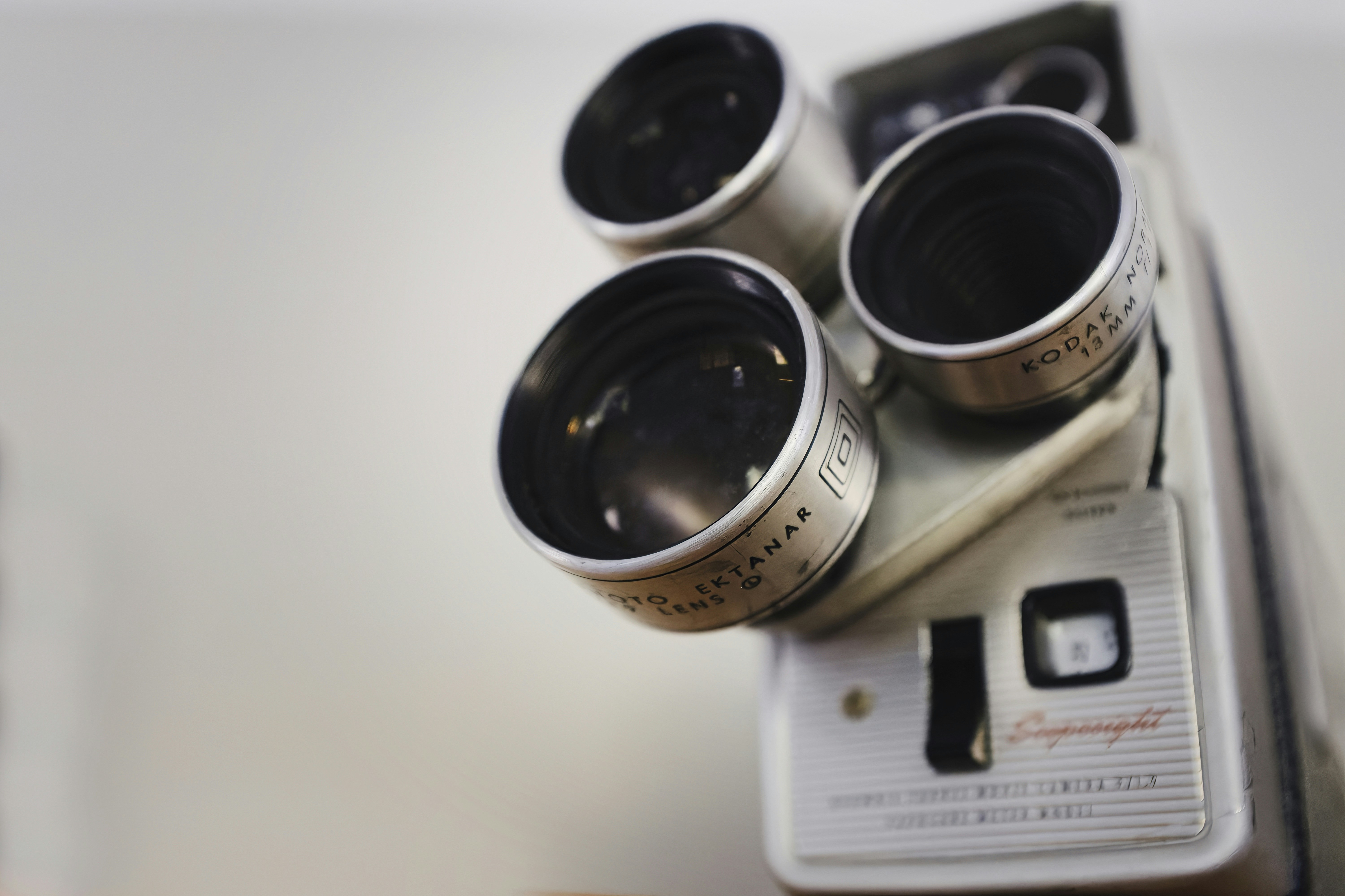 a couple of cameras sitting on top of a table