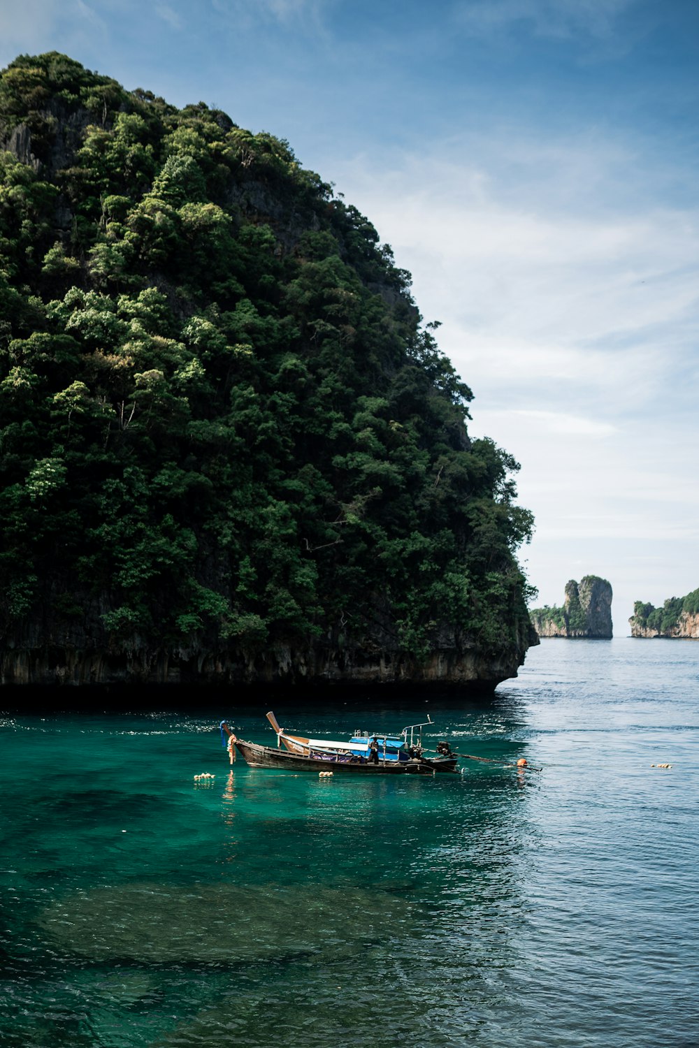 a boat floating on top of a body of water