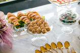 Close-up of a beautifully arranged catering spread at a business event.