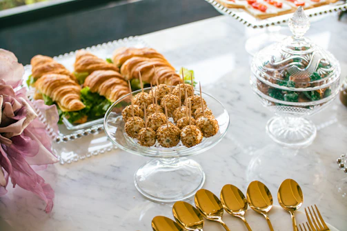 Close-up of a beautifully arranged catering spread at a business event.