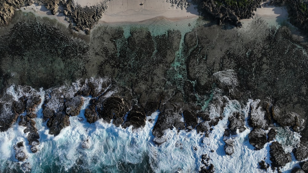 a bird's eye view of a beach and ocean