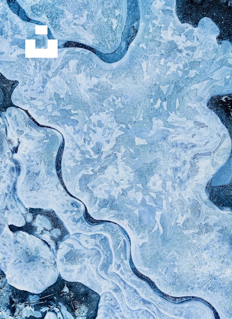 A close up of ice and water with a sky background photo – Free Nature ...