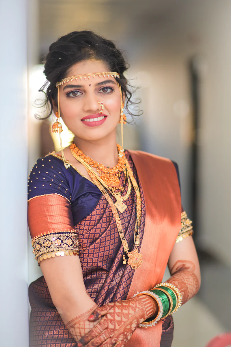 Maharashtrian bride in a paithani saree and nath