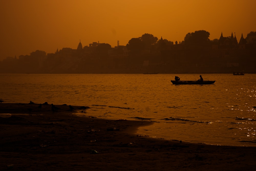 a person in a boat on a body of water