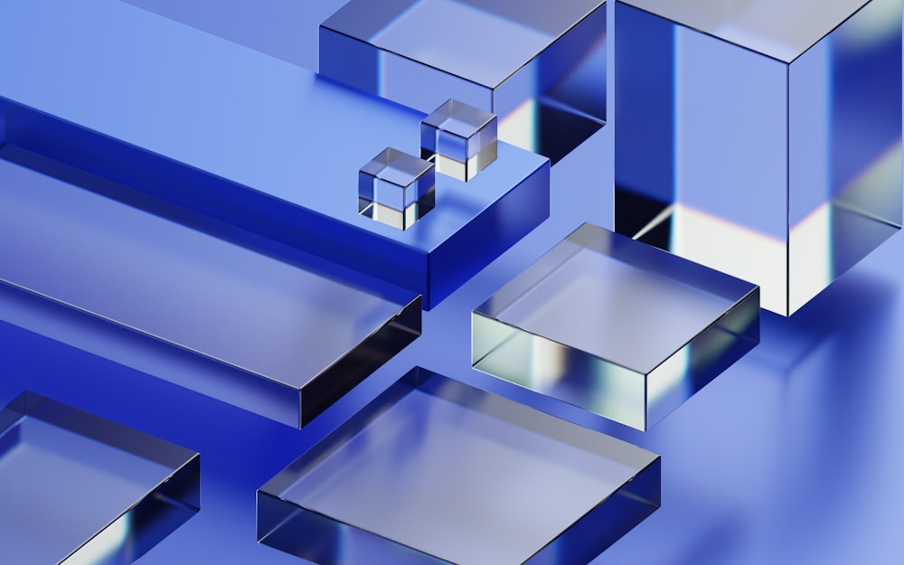 a group of mirrors sitting on top of a blue surface