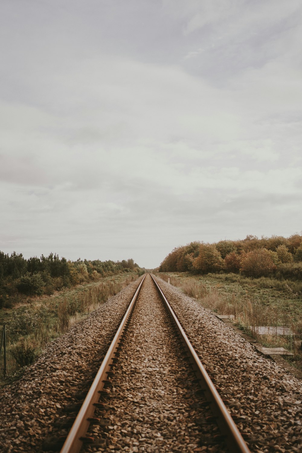 a train track with a sky background