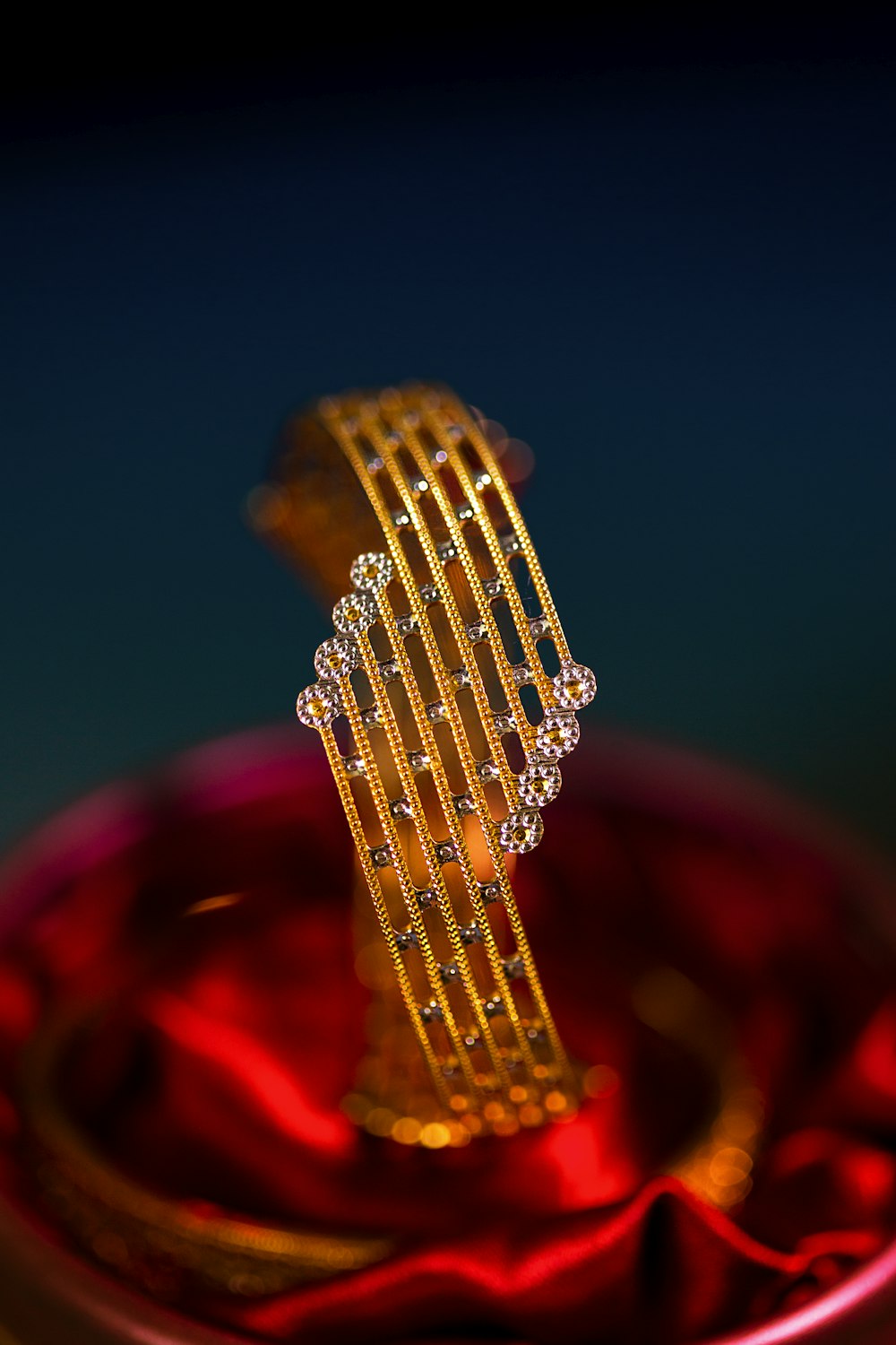 a close up of a piece of jewelry on a table