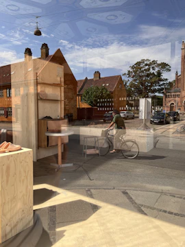 A freshly cleaned storefront window reflecting sunlight on a clear Santa Cruz morning