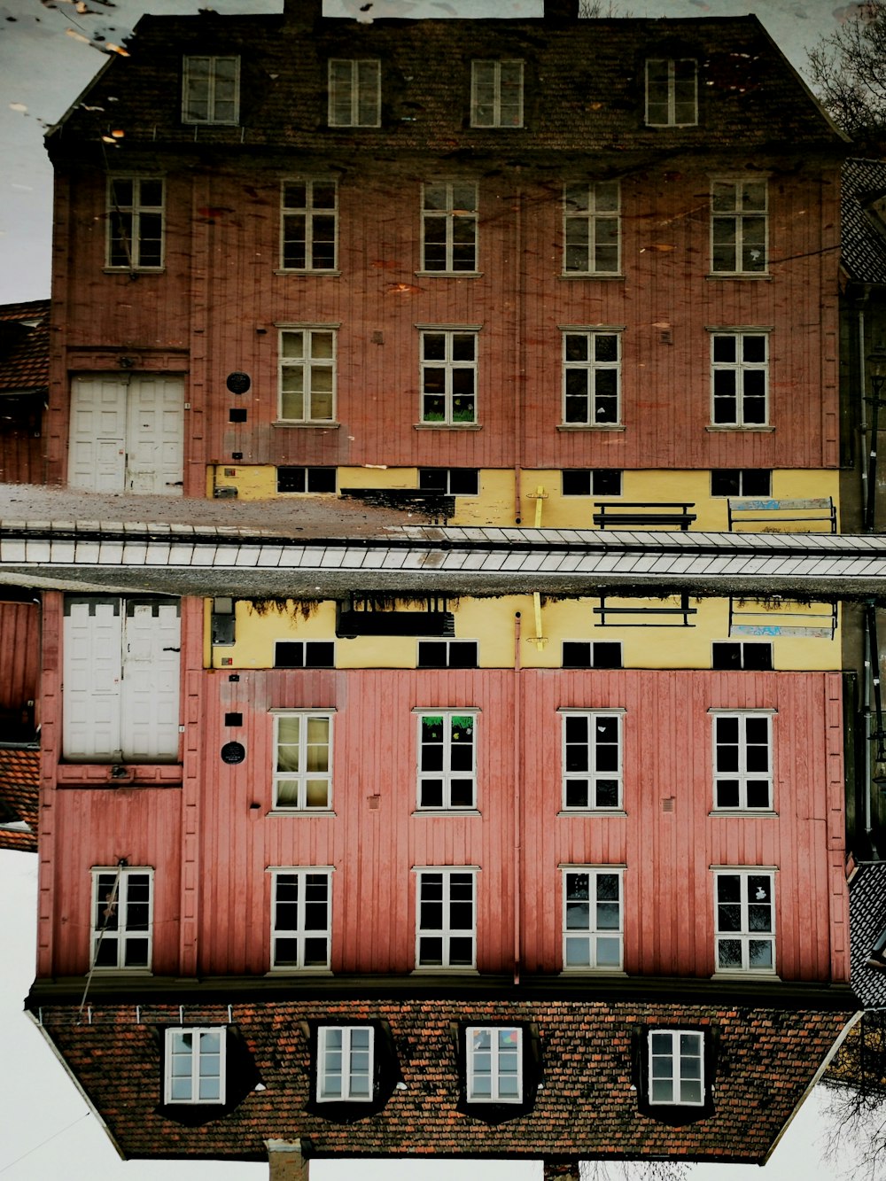 a reflection of a building in the water