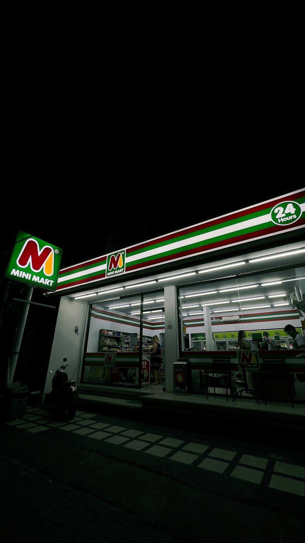 a fast food restaurant lit up at night