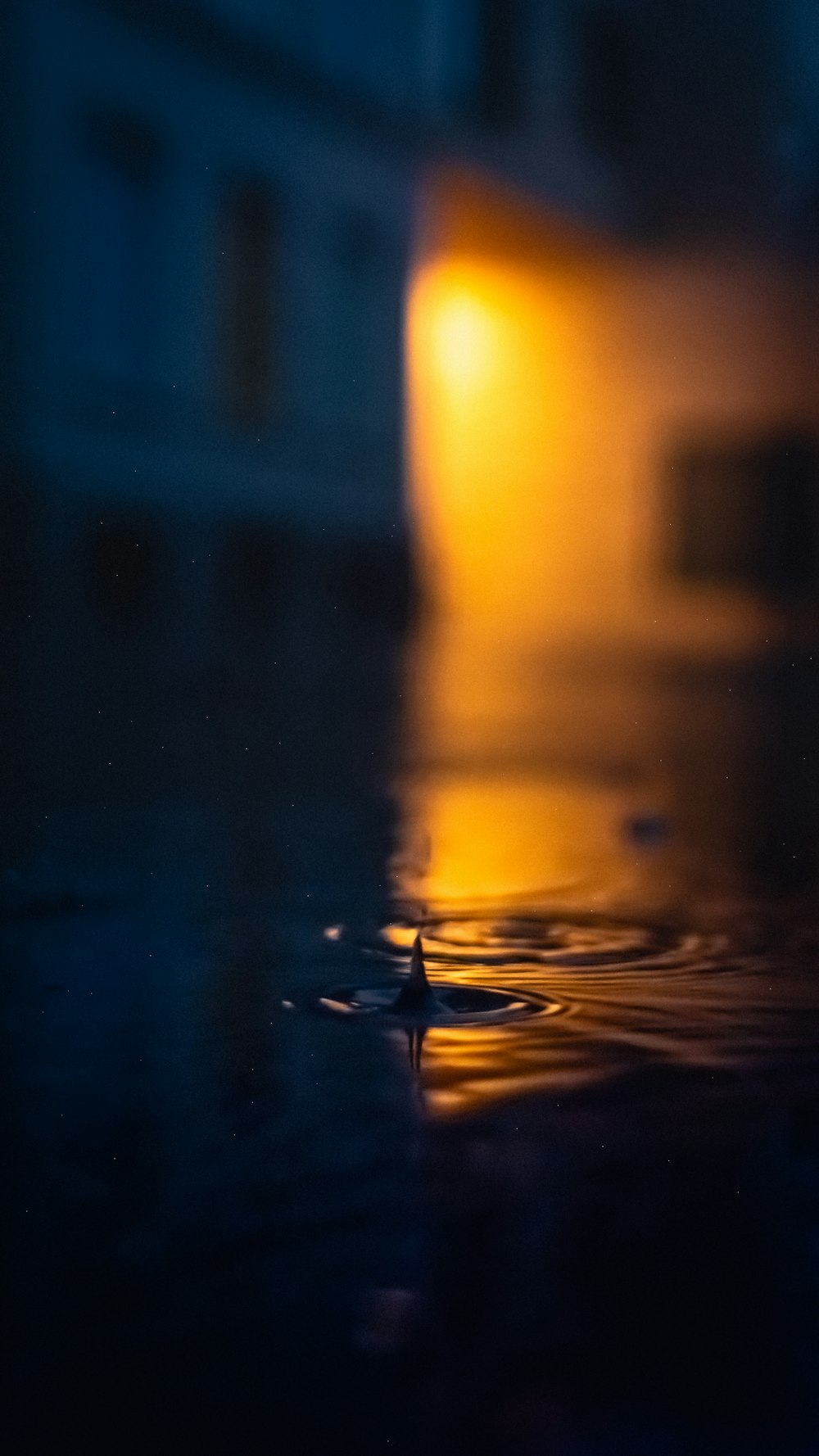 a blurry photo of a building and water photo – Free Switzerland Image on  Unsplash