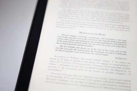 A close-up image of a book page with text focusing on meditation and scriptural interpretation. The text is primarily in black font, with some headings in a larger or bold type. The page is well-lit, capturing the details of the printed words.