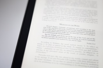 A close-up image of a book page with text focusing on meditation and scriptural interpretation. The text is primarily in black font, with some headings in a larger or bold type. The page is well-lit, capturing the details of the printed words.