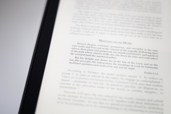 A close-up image of a book page with text focusing on meditation and scriptural interpretation. The text is primarily in black font, with some headings in a larger or bold type. The page is well-lit, capturing the details of the printed words.