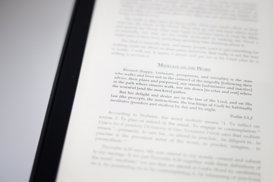 A close-up image of a book page with text focusing on meditation and scriptural interpretation. The text is primarily in black font, with some headings in a larger or bold type. The page is well-lit, capturing the details of the printed words.