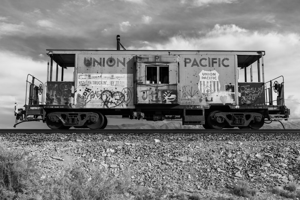 a black and white photo of a train car