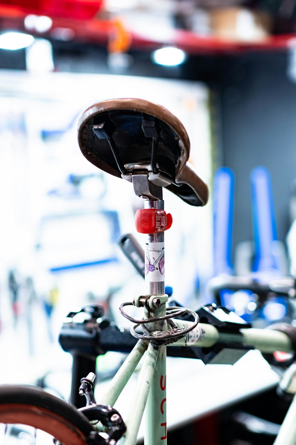 a close up of a bicycle with a hat on it