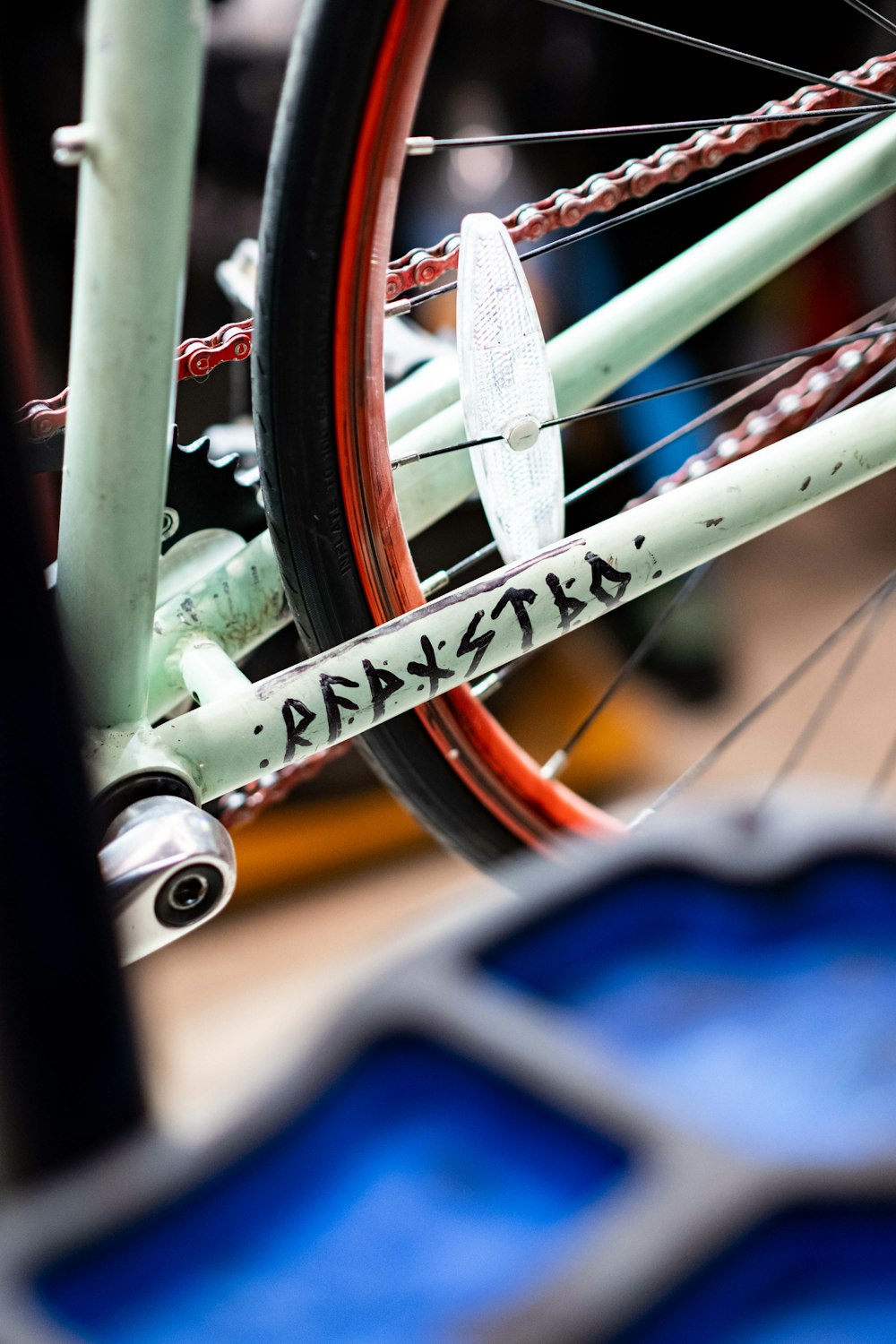 a close up of a bike with a red rim