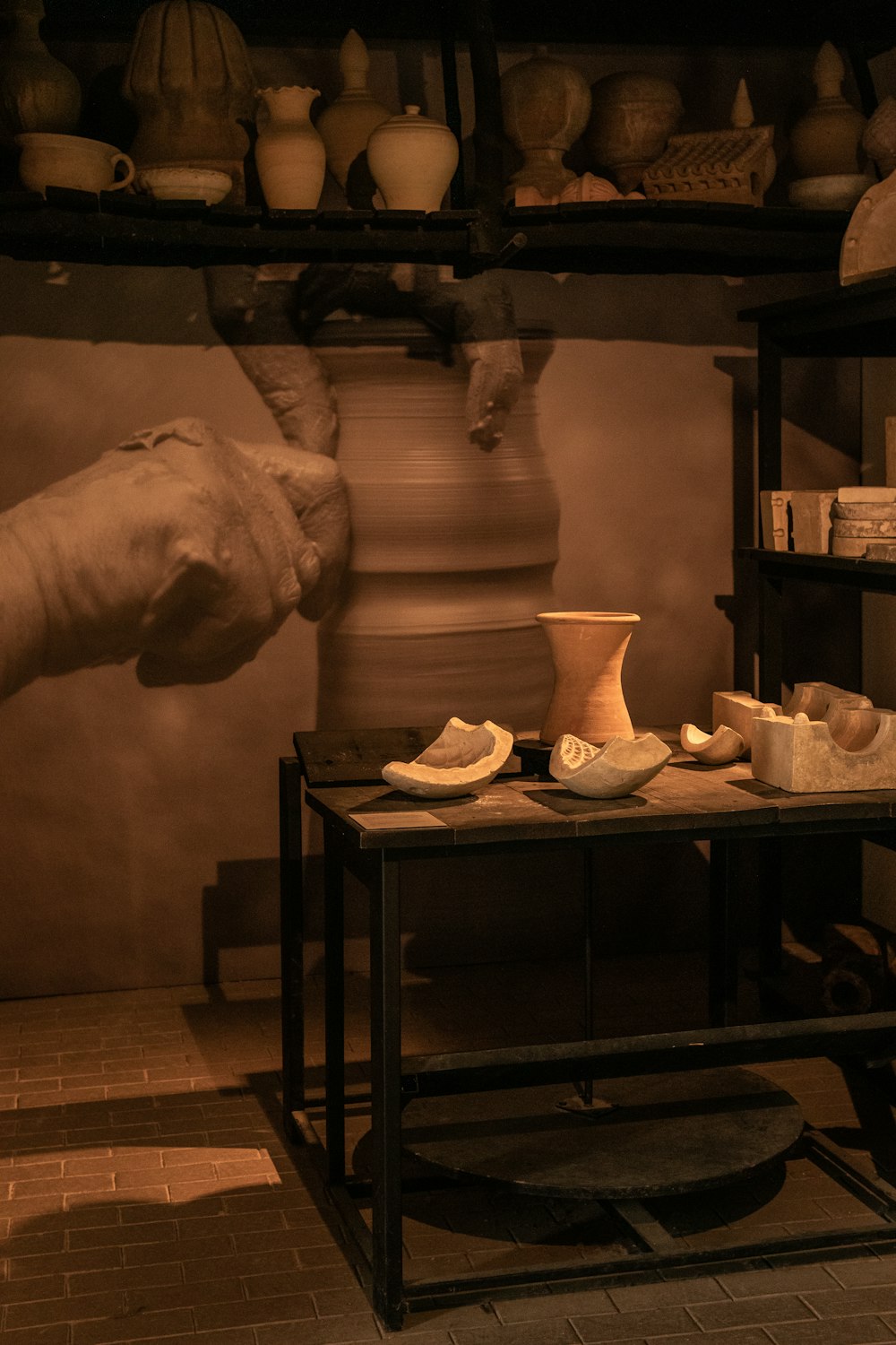 a pottery shop with pottery on a table