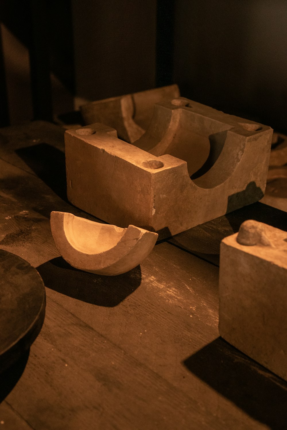 a couple of bowls sitting on top of a wooden table