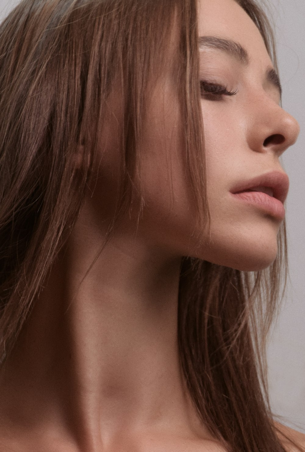 a close up of a woman with long hair