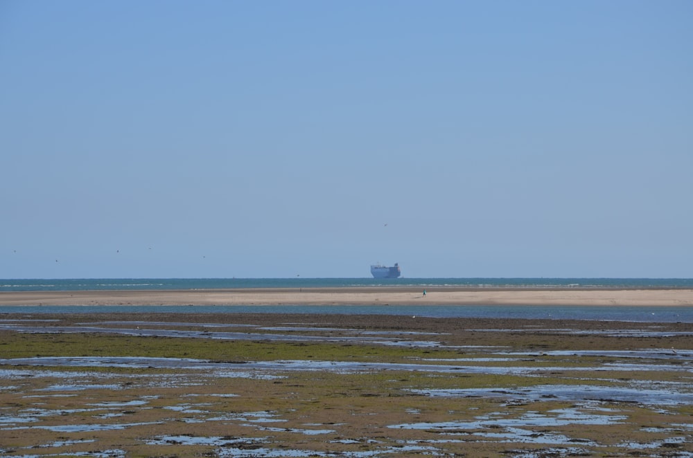 a large ship is out in the ocean
