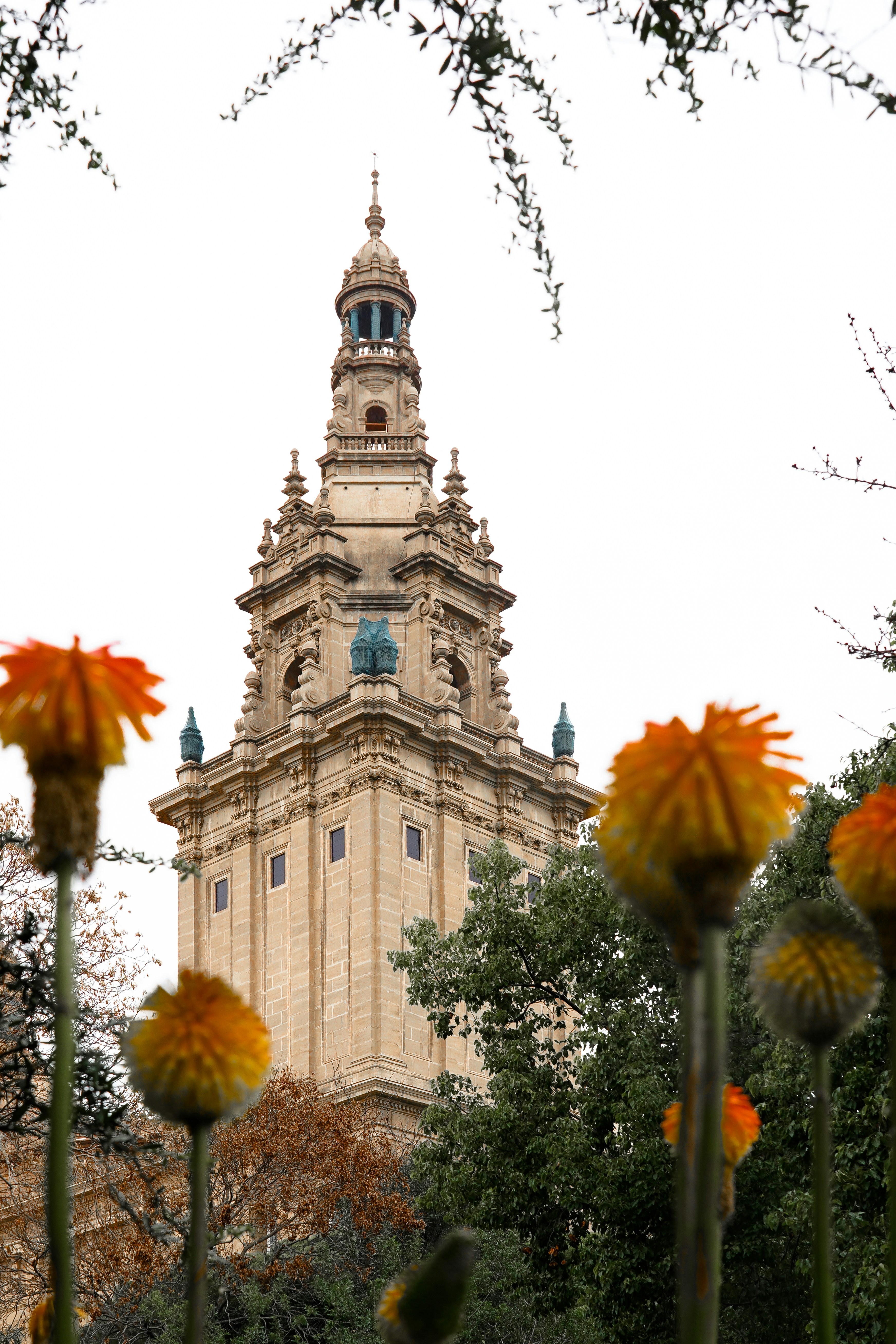 a tall tower with a clock on the top of it