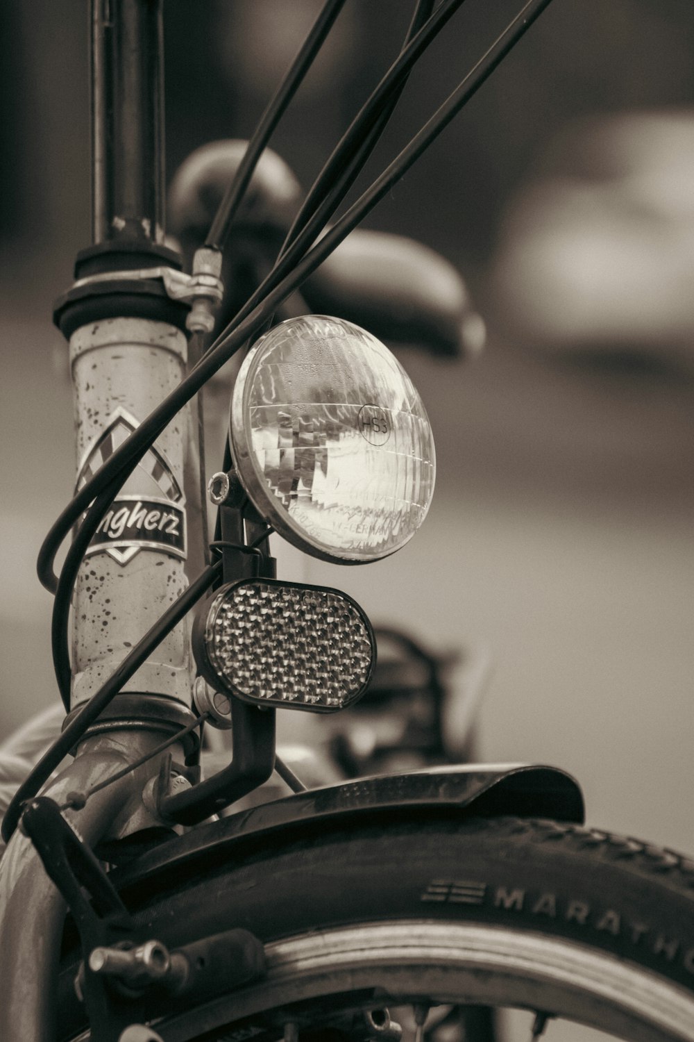 a close up of a bike with a light on it