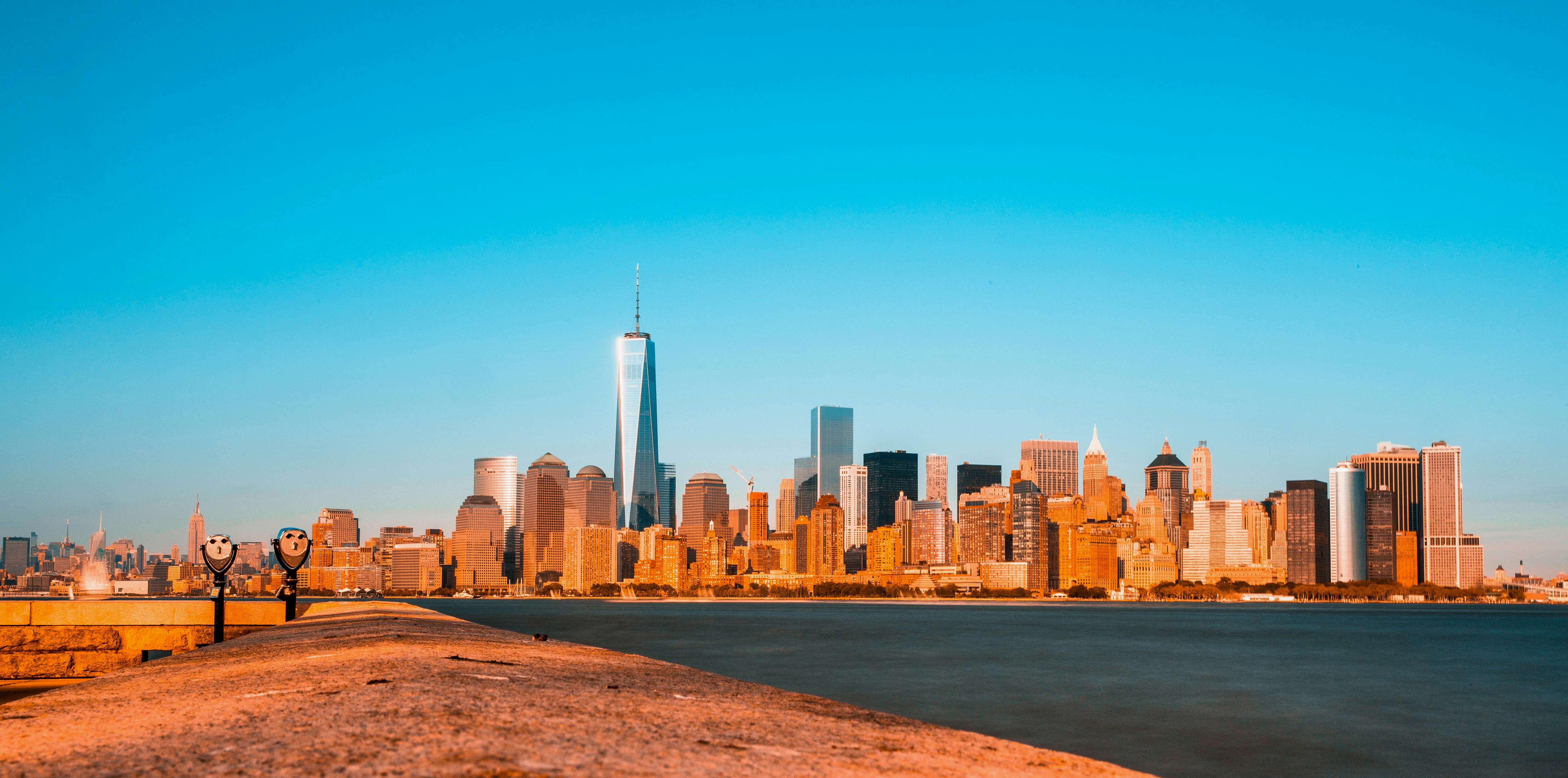 a view of a city skyline from across the water