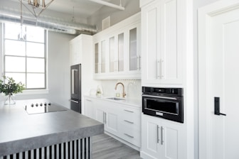 Kitchen area featuring modern appliances and ample counter space.