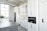 A beautifully remodeled kitchen featuring modern appliances and elegant cabinetry.