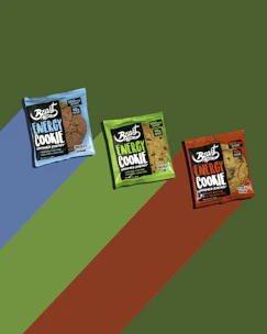 A hand holding a pack of energy-boosting vitamin gums with a lively, fresh design.