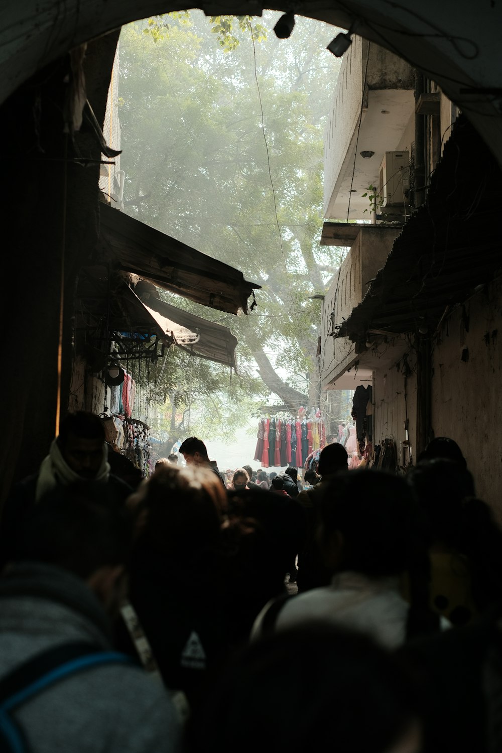 a group of people walking down a street