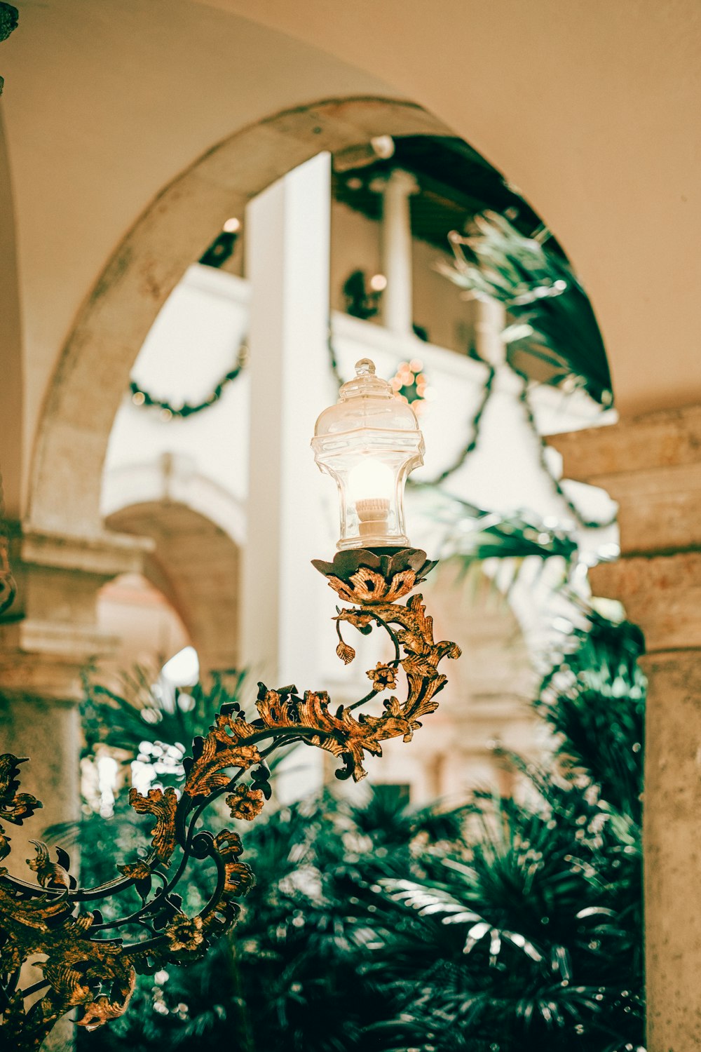 a chandelier hanging from the ceiling of a building