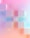 a blurry image of cubes on a pink and blue background