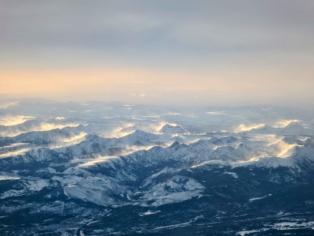 a view of a mountain range from an airplane