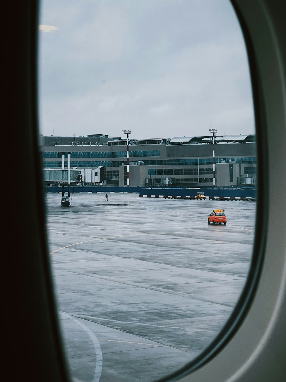 a view of an airport from a plane window