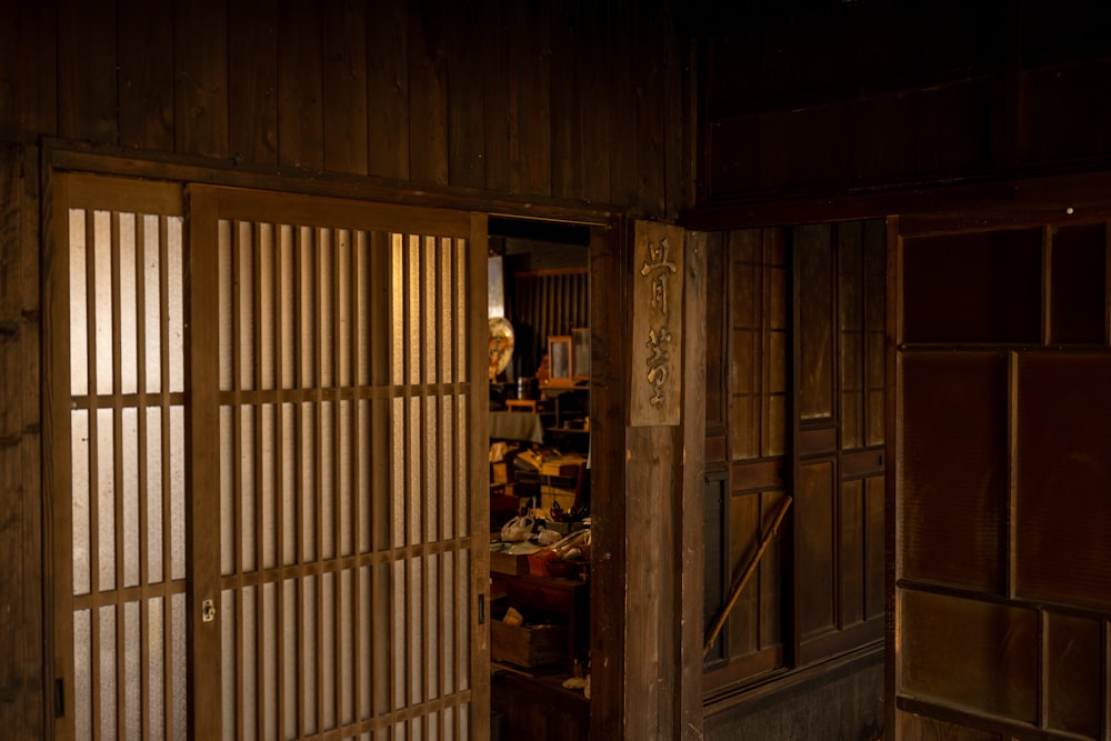 a room with a wooden door and a window