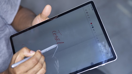 A professional signing a digital document on a tablet with a secure lock icon overlay.